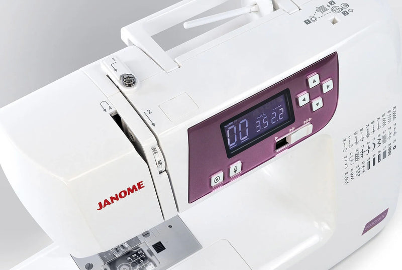Janome 2030DC-G computerized sewing machine in grapevine purple front profile view showing the control dashboard.