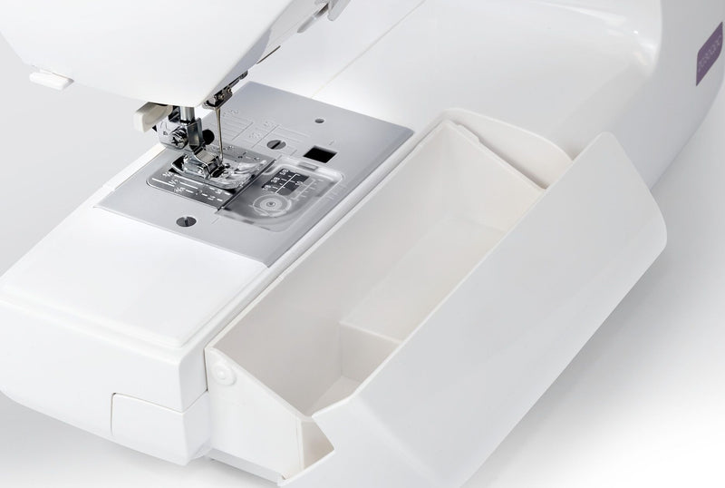 Janome 2030DC-G computerized sewing machine in grapevine purple front profile view showing the control dashboard.