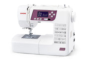 Janome 3160QDC-G computerized sewing and quilting machine in grapevine purple front view displaying the navigation layout.