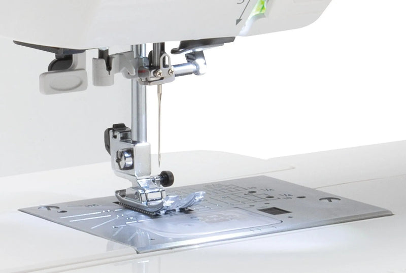 Janome 3160QDC-G computerized sewing and quilting machine in grapevine purple front view displaying the navigation layout.