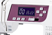 Janome 3160QDC-G computerized sewing and quilting machine in grapevine purple front view displaying the navigation layout.