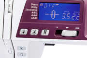 Janome 4120QDC-G computerized sewing and quilting machine in grapevine purple front view displaying the stitch index chart