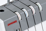 Janome MyLock 454D overlock serger front view showing the color-coded threading map and tension dials.
