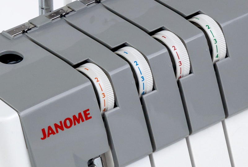 Janome MyLock 454D overlock serger front view showing the color-coded threading map and tension dials.