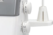 Janome MyLock 454D overlock serger front view showing the color-coded threading map and tension dials.