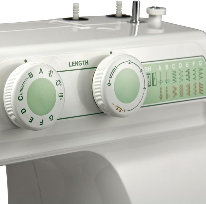 Janome 2212 mechanical sewing machine front view showcasing the stitch selection dial and clean white design.