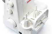 Janome MyLock 654D 4-thread overlock serger front view showcasing the color-coded threading guide and tension dials.