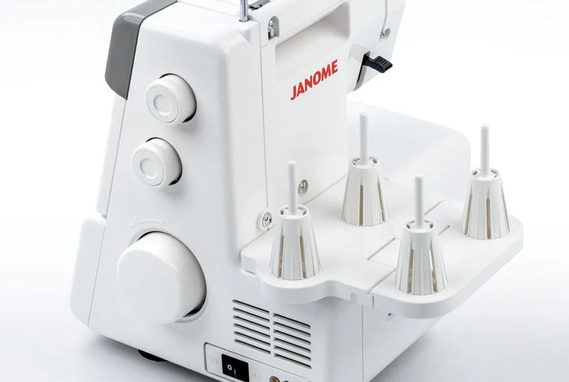 Janome MyLock 654D 4-thread overlock serger front view showcasing the color-coded threading guide and tension dials.