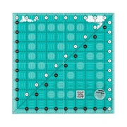 Creative Grids CGR10 ten and a half inch square quilt ruler showing black and white grid lines.
