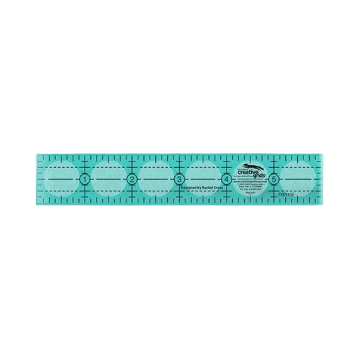 Creative Grids CGR106 one by six inch rectangle acrylic quilt ruler showing black and white lines.