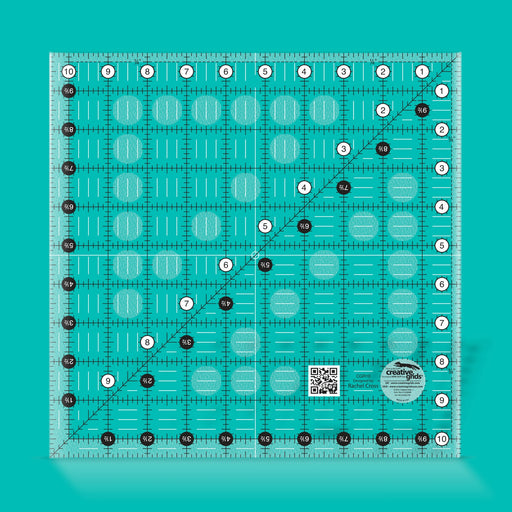 Creative Grids CGR10 ten and a half inch square quilt ruler showing black and white grid lines.