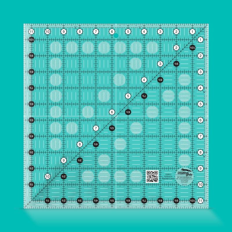 Creative Grids CGR11 eleven and a half inch square quilt ruler showing clear grid lines.