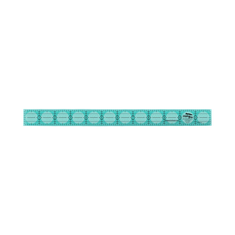 Creative Grids CGR112 one by twelve inch long rectangle acrylic quilt ruler showing black and white grid markers.
