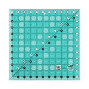 Creative Grids CGR11 eleven and a half inch square quilt ruler showing clear grid lines.