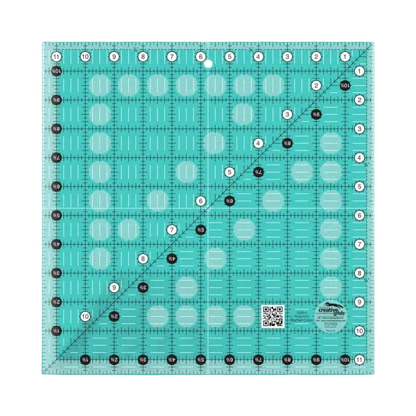 Creative Grids CGR11 eleven and a half inch square quilt ruler showing clear grid lines.