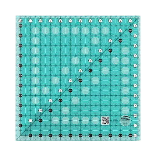 Creative Grids CGR12 twelve and a half inch square acrylic quilt ruler with black and white grid markings.