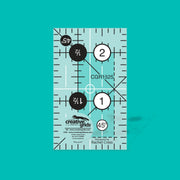 Creative Grids CGR1525 one and a half by two and a half inch mini rectangle quilt ruler.