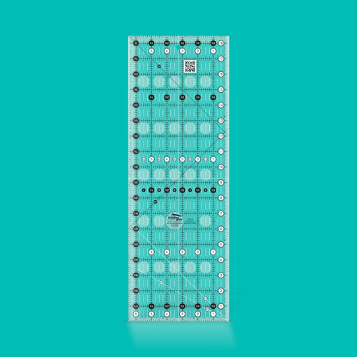 Creative Grids CGR18 six and a half by eighteen and a half inch rectangle quilt ruler with non slip backing.