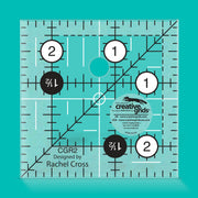Creative Grids CGR2 two and a half inch square quilt ruler with non slip ring grips.