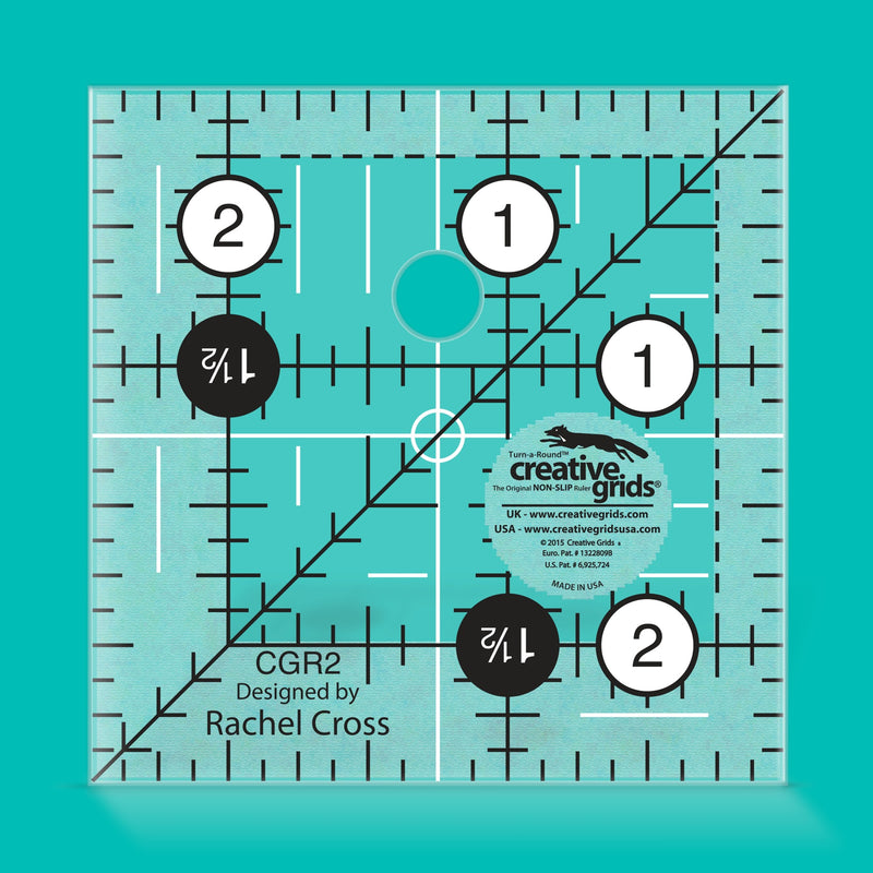 Creative Grids CGR2 two and a half inch square quilt ruler with non slip ring grips.