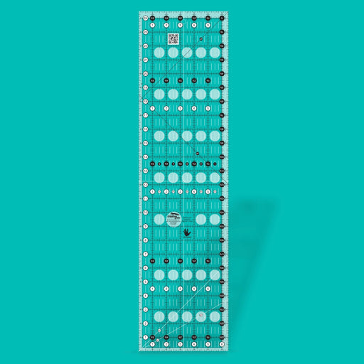 Creative Grids CGR24LEFT six and a half by twenty four and a half inch left handed rectangle quilt ruler.