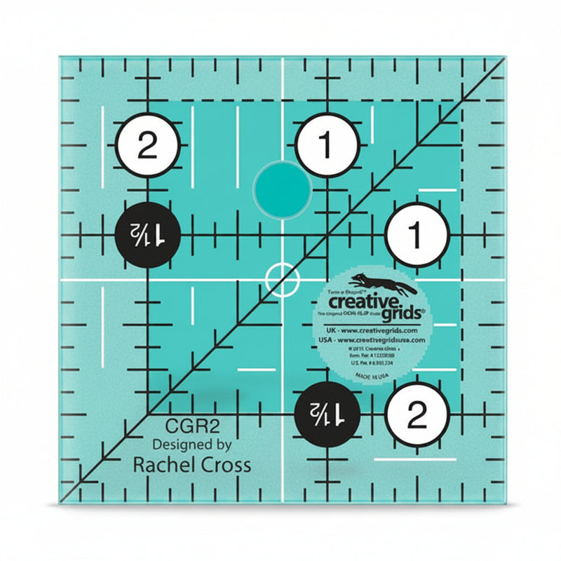 Creative Grids CGR2 two and a half inch square quilt ruler with non slip ring grips.