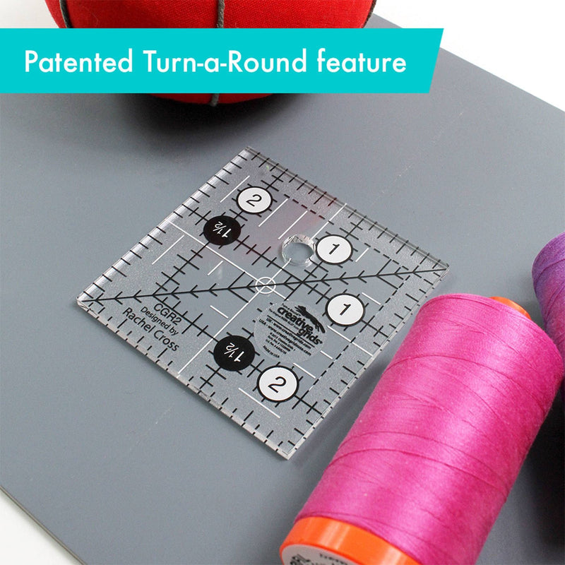 Creative Grids CGR2 two and a half inch square quilt ruler with non slip ring grips.