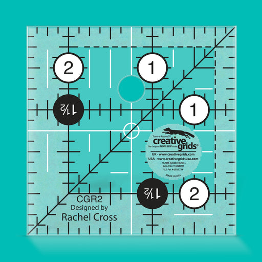 Creative Grids CGR2 two and a half inch square quilt ruler with non slip ring grips.