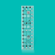 Creative Grids CGR312 three and a half by twelve and a half inch rectangle quilt ruler.