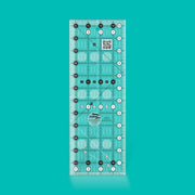 Creative Grids CGR412 four and a half by twelve and a half inch rectangle quilt ruler with non slip backing.