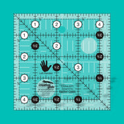 Creative Grids CGR4LEFT four and a half inch left handed square quilt ruler displaying right to left numbers.