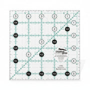 Creative Grids CGR5 five and a half inch square quilt ruler with non slip ring grips.