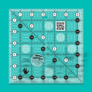 Creative Grids CGR6LEFT six and a half inch left handed square quilt ruler displaying right to left numbers.