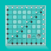 Creative Grids CGR8 eight and a half inch square quilt ruler with non slip ring grips.