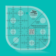 Creative Grids CGRCCC curved corner cutter quilt ruler displaying multi radius tracking arcs.