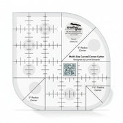 Creative Grids CGRCCC curved corner cutter quilt ruler displaying multi radius tracking arcs.