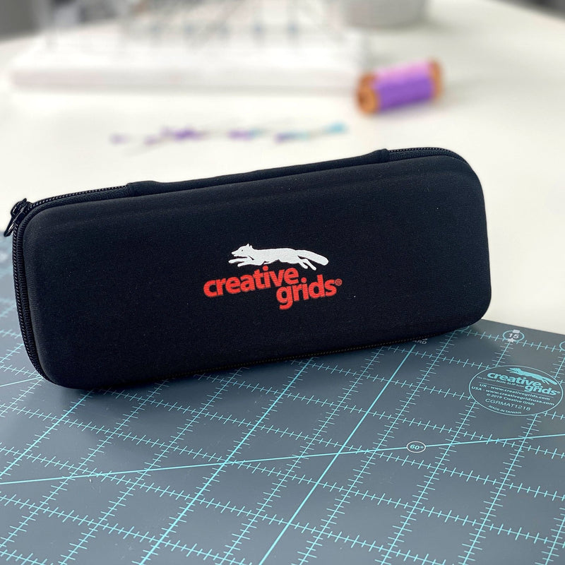 Creative Grids CGRCUTCASE rotary cutter hard EVA case showing the sleek black semi rigid zippered exterior.