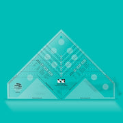 Creative Grids CGRDH1XL cat's cradle ruler XL tool showing clear layout lines and trimming zones.