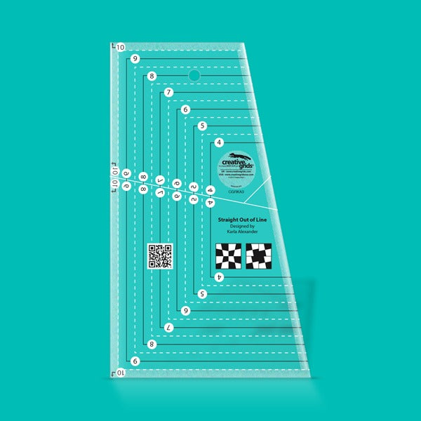 Creative Grids Straight Out of Line 6 inch by 10 inch acrylic quilt ruler CGRKA3 on a crisp white surface.