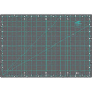 Creative Grids 12 inch by 18 inch double sided self healing rotary cutting mat CGRMAT1218 flat view.