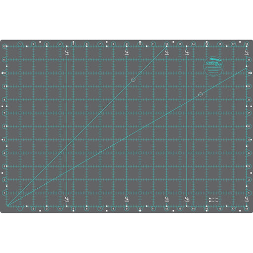 Creative Grids 12 inch by 18 inch double sided self healing rotary cutting mat CGRMAT1218 flat view.