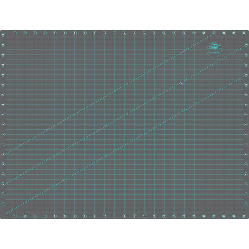 Creative Grids 18 inch by 24 inch double sided self healing rotary cutting mat CGRMAT1824 flat view.