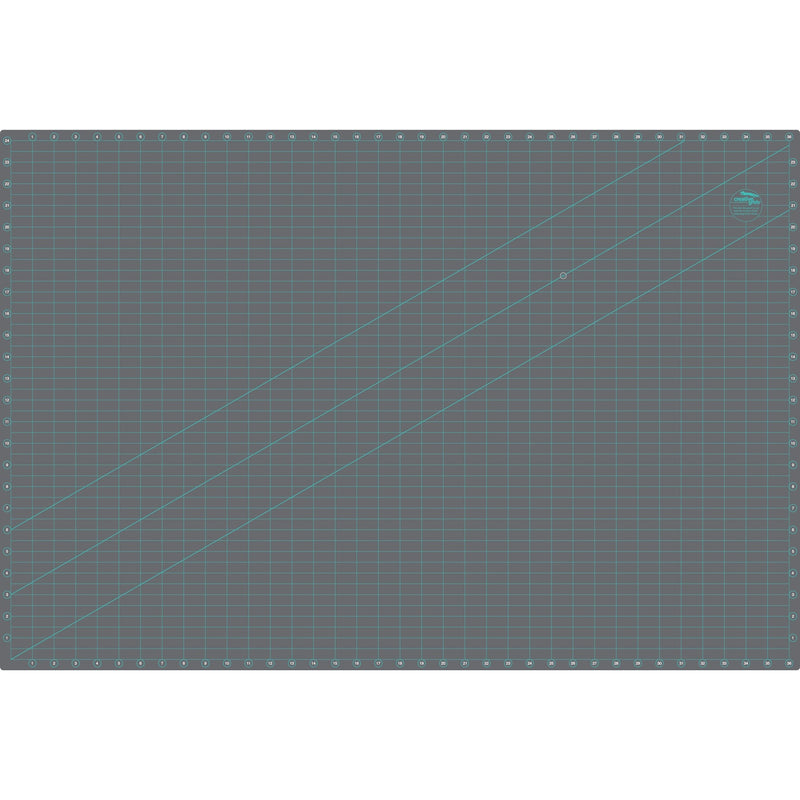 Creative Grids 24 inch by 36 inch double sided self healing rotary cutting mat CGRMAT2436 flat perspective view.