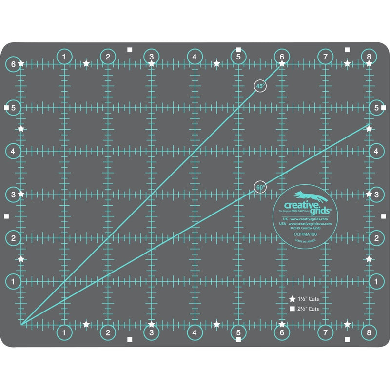 Creative Grids 6 inch by 8 inch portable double sided self healing rotary cutting mat CGRMAT68 flat view.