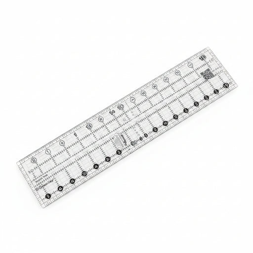 Creative Grids Quick Trim 3.5-inch by 12.5-inch rectangle quilting ruler laid flat over patterned fabric.
