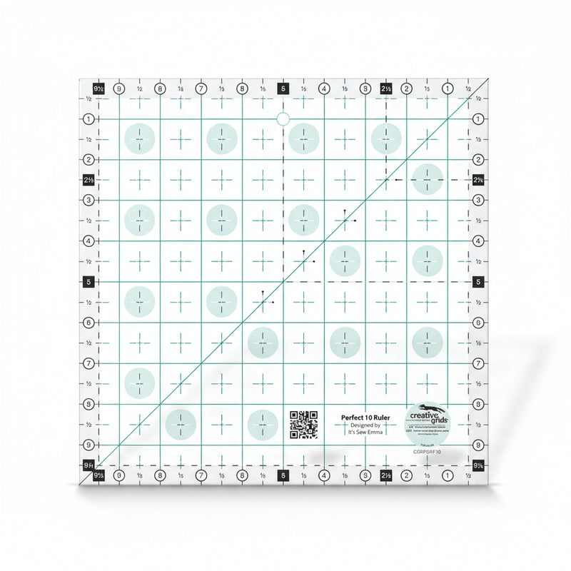 Creative Grids Perfect 10 square quilting ruler placed perfectly over a 10-inch fabric layer cake block.