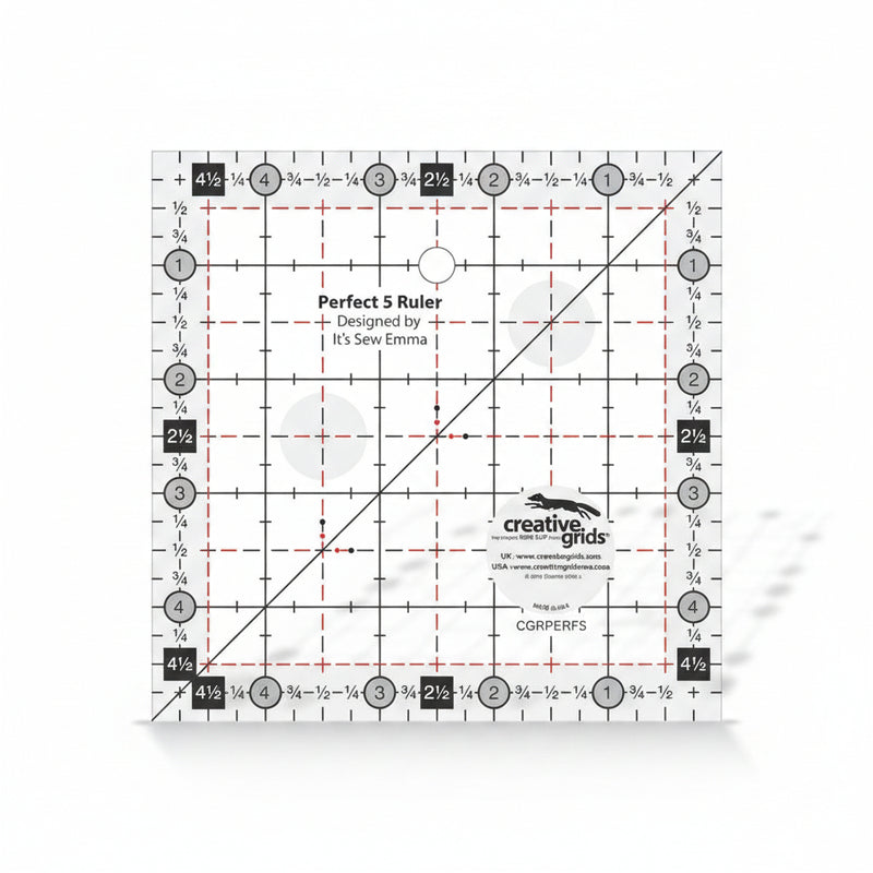 Creative Grids Perfect 5 square quilting ruler placed directly over a 5-inch fabric charm pack square.