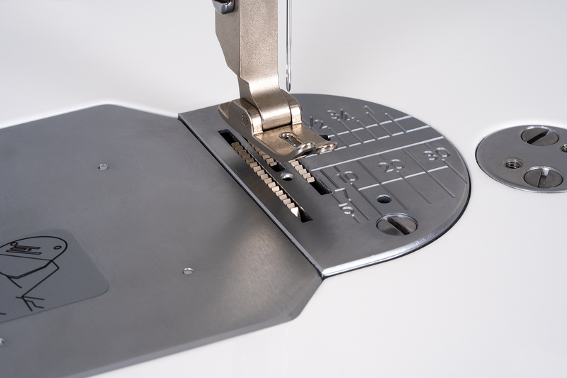 Janome reference photo: HD9QC Professional needle plate and feed area close-up