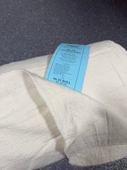 Close-up of ThreadWorks Soft & Elegant 80/20 quilt batting roll