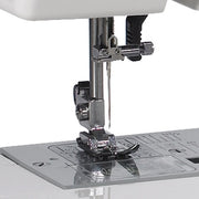 Janome MyStyle100 mechanical sewing machine front view highlighting the simple stitch dial.